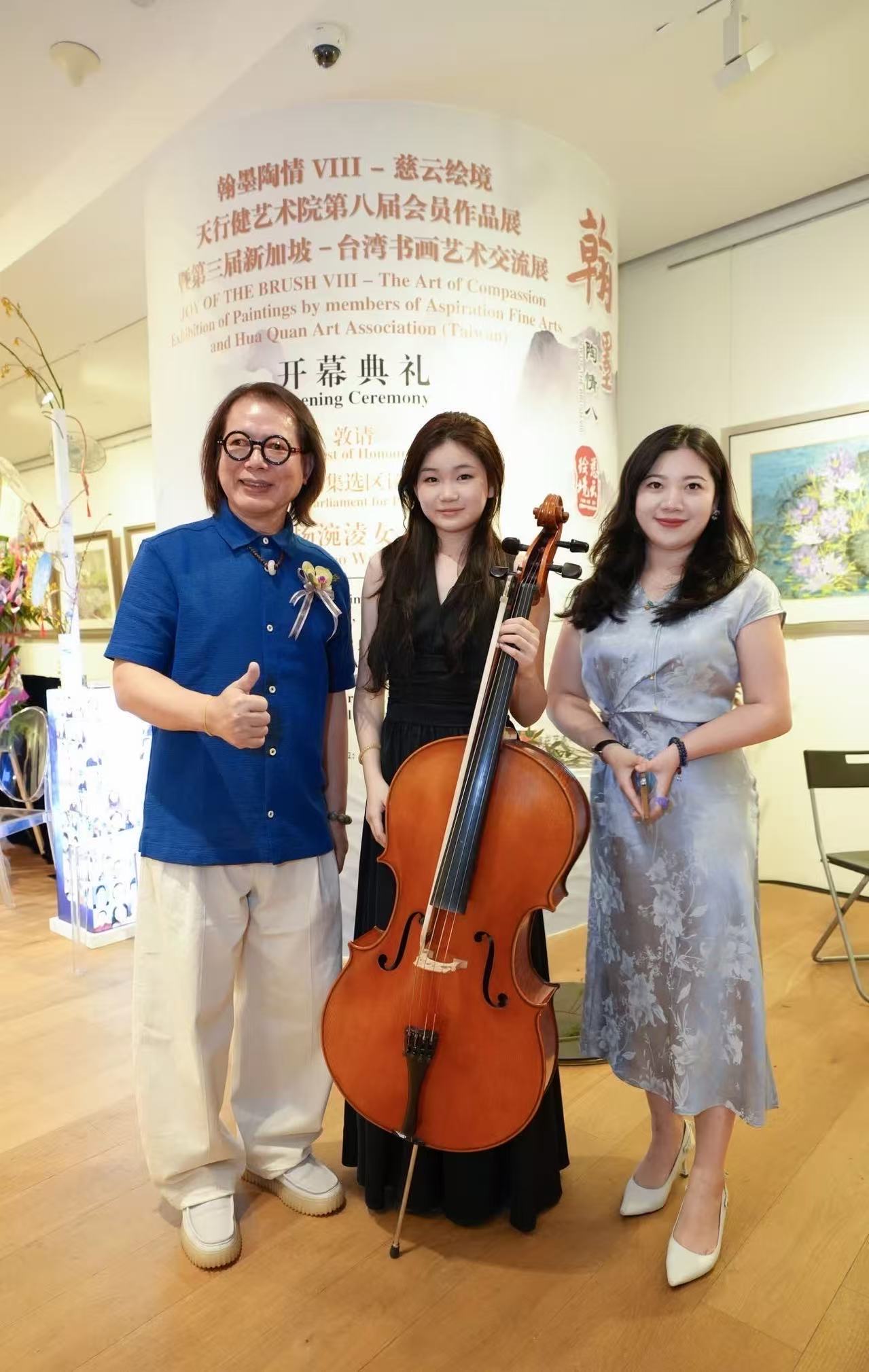 A student with mentors at an arts and business gathering